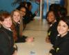 female students sitting at table